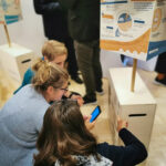 Menschen in Aktion beim Klimaladen