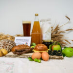 Diverse Biosphären-Produkte auf einem Tisch mit Produkt-Zertifikat